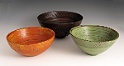 Milk Painted Bowls  A group of 3 Milk Painted Bowls.  I took this photo for a "No Sanding Demo" I did for my local woodturning clubs. The photo shows 3 different colors of Milk Paint I like.  Black, Tavern Green, and Salem Red over Marigold Yellow.   And it shows 3 different surface enhancements.  Beads, Coves and Power Carved Rim.